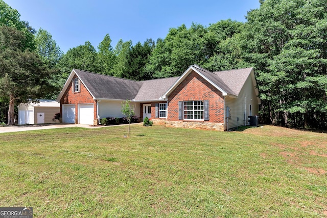 150 Buckeye Trails Dr, Commerce, GA 30530 - ranch-style house featuring a garage, a front lawn, brick siding, central air condition unit, and driveway