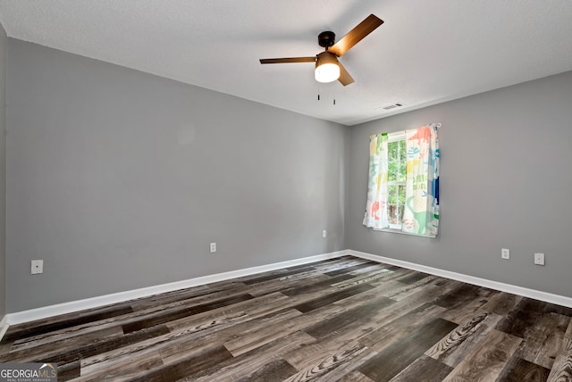 150 Buckeye Trails Dr, Commerce, GA 30530 - empty room featuring baseboards, a ceiling fan, and dark wood-style floors