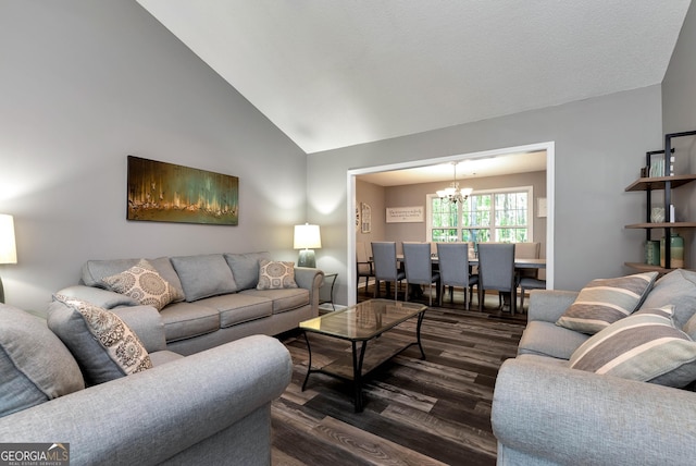 150 Buckeye Trails Dr, Commerce, GA 30530 - living room with dark wood-style flooring, a notable chandelier, and high vaulted ceiling