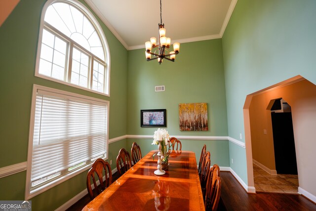 108 Hope Ln, Cedartown, GA 30125 - dining area with an inviting chandelier, a towering ceiling, a wealth of natural light, and visible vents