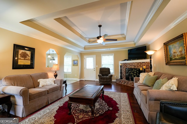 108 Hope Ln, Cedartown, GA 30125 - living room featuring a ceiling fan, ornamental molding, wood finished floors, a raised ceiling, and a fireplace