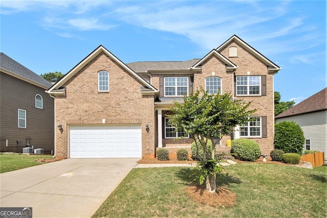 35 Stonebridge Blvd, Newnan, GA 30265 - traditional-style house with brick siding, driveway, an attached garage, and a front lawn