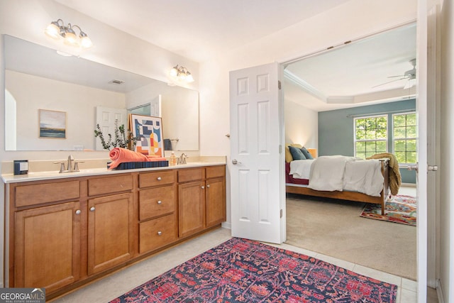 full bathroom with connected bathroom, double vanity, tile patterned floors, and ceiling fan