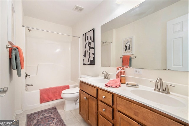 full bath with toilet, tile patterned floors, visible vents, and a sink