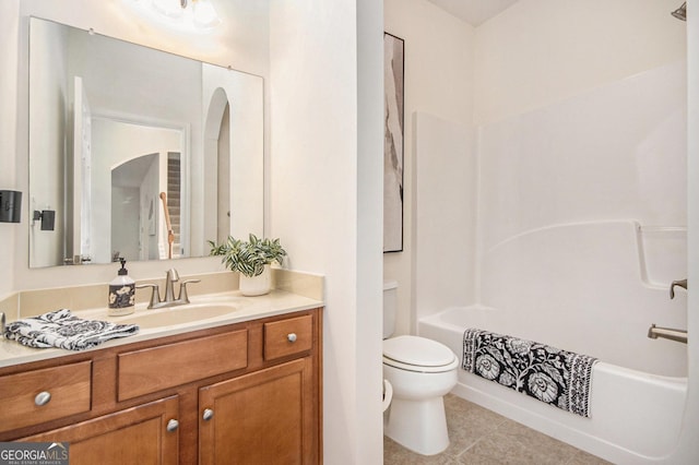 full bathroom with toilet, shower / bathing tub combination, tile patterned flooring, and vanity