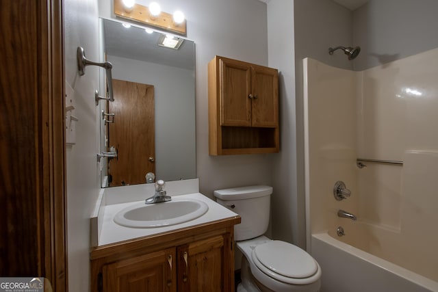 full bathroom featuring shower / bathtub combination, toilet, and vanity