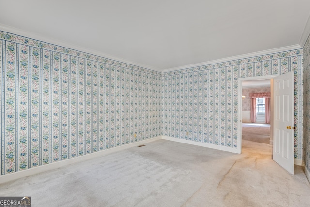 4481 Mccart Cv, Stone Mountain, GA 30083 - unfurnished room featuring carpet flooring, crown molding, wallpapered walls, and baseboards