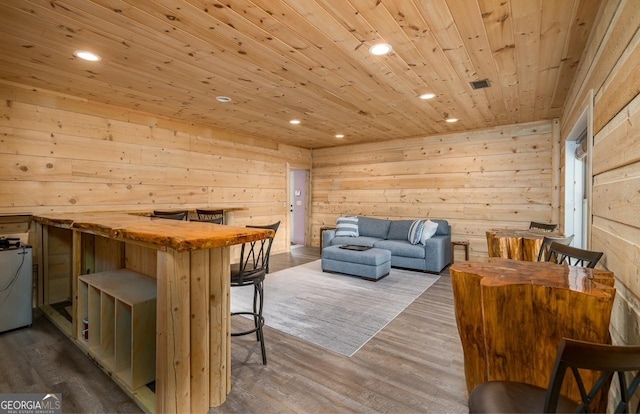 interior space with recessed lighting and wood finished floors
