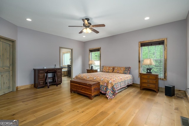 bedroom with recessed lighting, a ceiling fan, light wood-type flooring, and visible vents