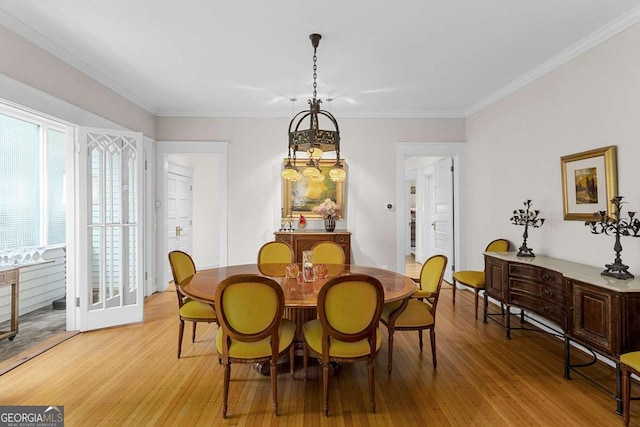 171 Westminster Dr NE, Atlanta, GA 30309 - dining room with light wood-style floors and ornamental molding