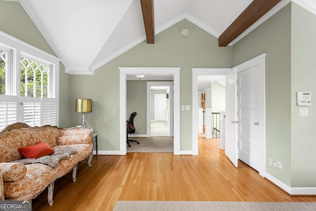 171 Westminster Dr NE, Atlanta, GA 30309 - living area with light wood-style floors, lofted ceiling, and baseboards