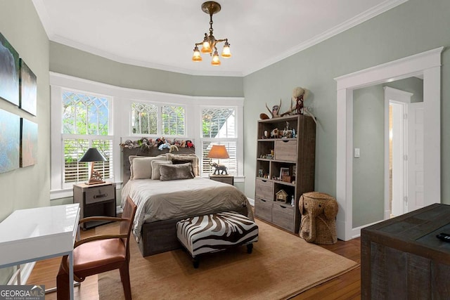 171 Westminster Dr NE, Atlanta, GA 30309 - bedroom with a chandelier, wood finished floors, and ornamental molding