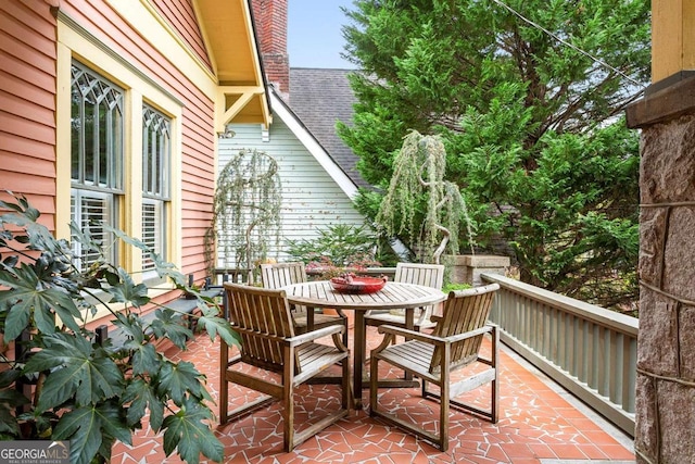 171 Westminster Dr NE, Atlanta, GA 30309 - balcony featuring outdoor dining area and a patio area
