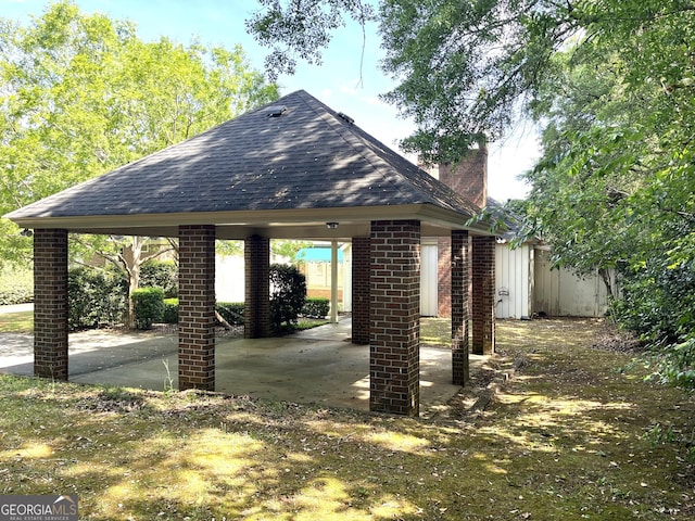 view of property's community featuring a patio and a gazebo