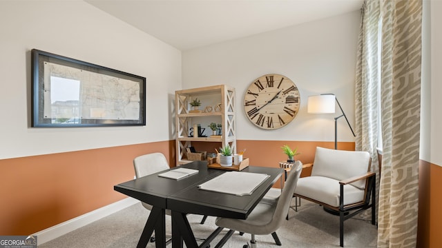 office space featuring baseboards and carpet