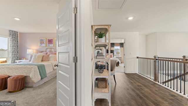 corridor featuring recessed lighting and wood finished floors