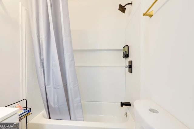 1418 2nd Ave, Macon, GA 31201 - bathroom with toilet and shower / tub combo with curtain