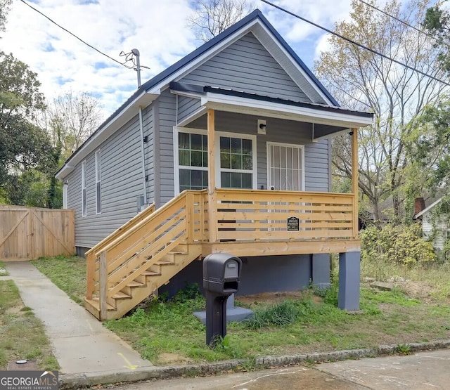 1418 2nd Ave, Macon, GA 31201 - view of front of property with fence and a deck
