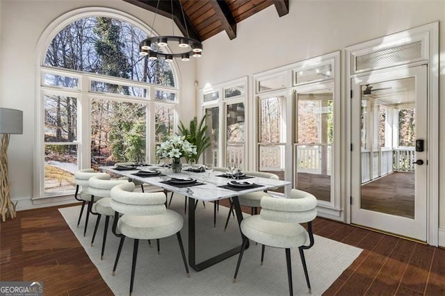 sunroom with beamed ceiling