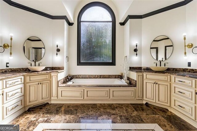 full bathroom with two vanities, ornamental molding, a sink, and a bath