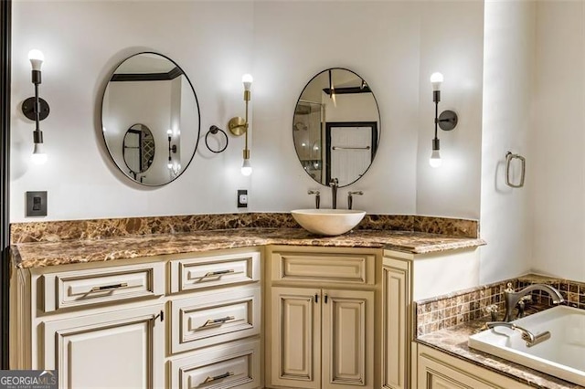 full bathroom with a bathtub and vanity
