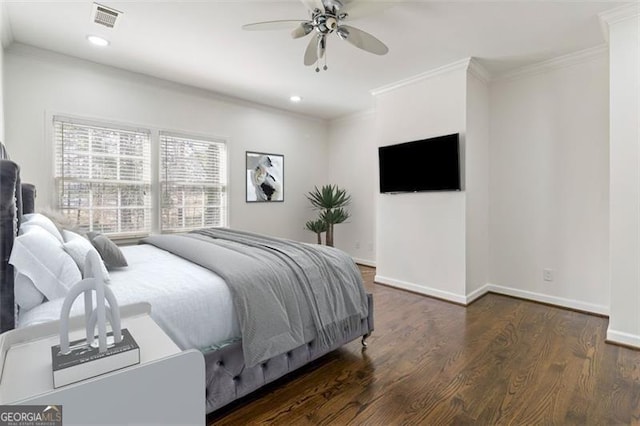 bedroom with recessed lighting, visible vents, ornamental molding, and wood finished floors