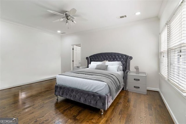 bedroom featuring ornamental molding, recessed lighting, wood finished floors, and visible vents