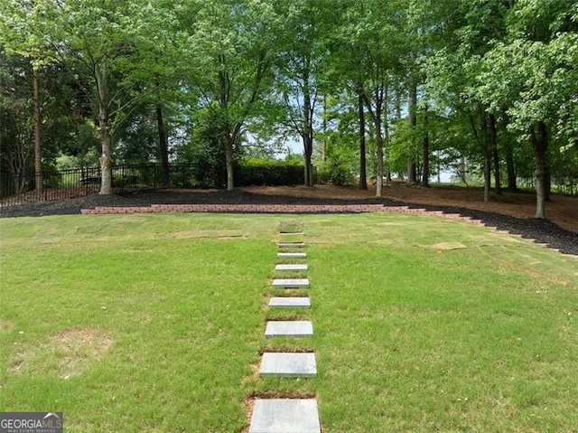 view of yard featuring fence