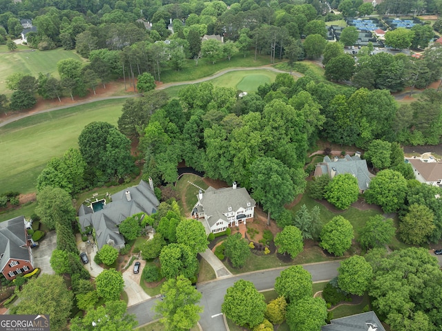 aerial view with a residential view and view of golf course