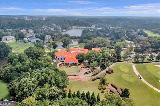 bird's eye view featuring a water view and golf course view
