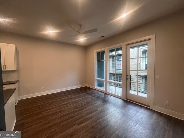 128 Bert Ln SE Unit 167, Atlanta, GA 30316 - interior space with baseboards, dark wood-style flooring, and ceiling fan