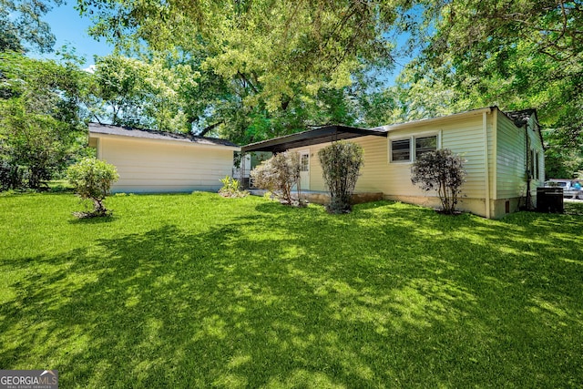 exterior space with a yard