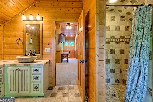 234 Raindance Ln, Clayton, GA 30525 - bathroom featuring a shower stall, wood walls, lofted ceiling, vanity, and ceiling fan
