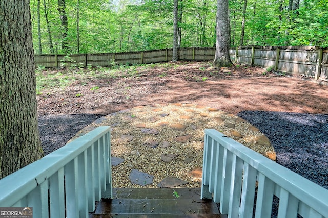 234 Raindance Ln, Clayton, GA 30525 - fenced backyard with a wooded view