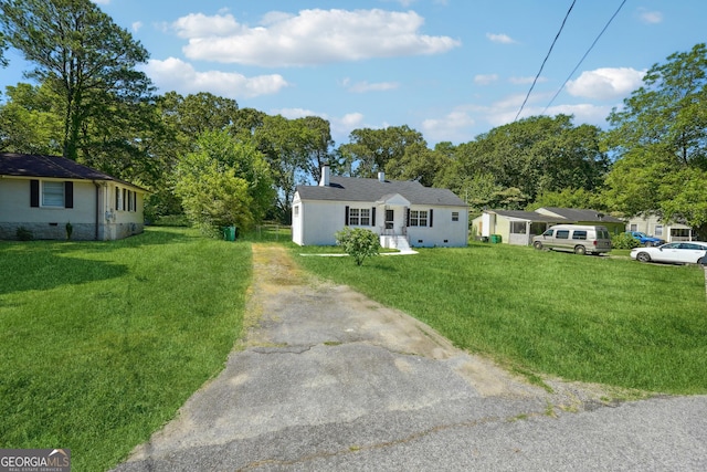 785 Alice St, Forest Park, GA 30297 - bungalow-style house with driveway and a front yard