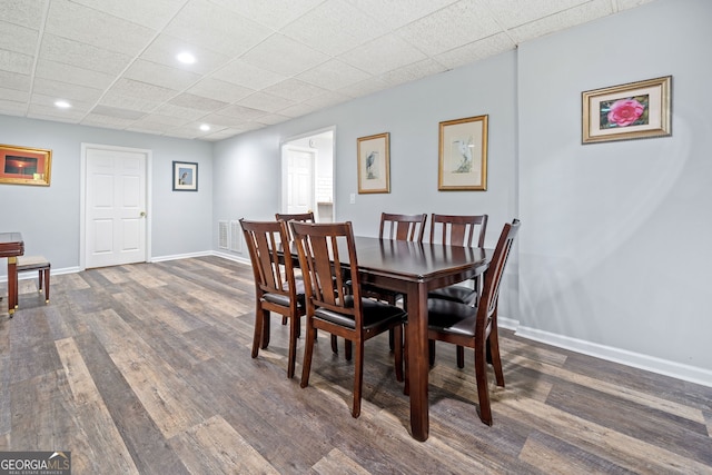 dining space with recessed lighting, baseboards, visible vents, and wood finished floors