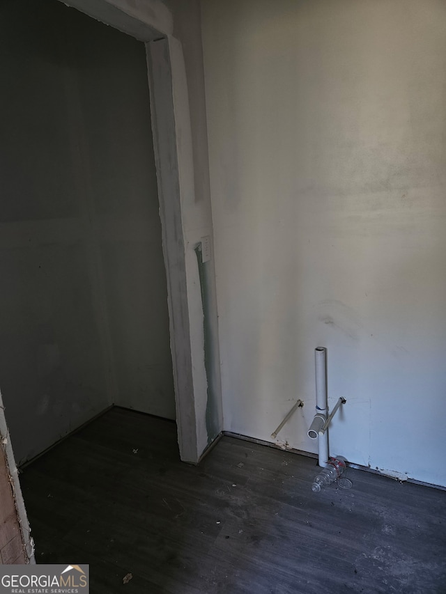 laundry room featuring wood finished floors