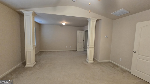 below grade area featuring visible vents, baseboards, and light carpet