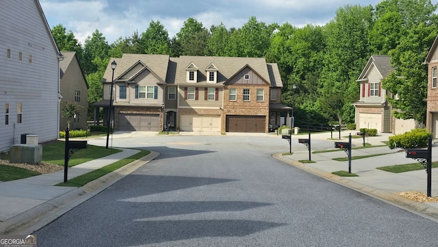 view of road with sidewalks and curbs