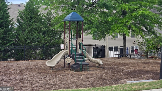 community jungle gym with fence