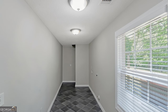 90 Heatherstone Way, Covington, GA 30016 - doorway featuring baseboards, plenty of natural light, and visible vents