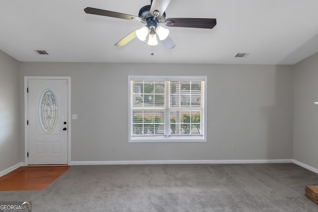 90 Heatherstone Way, Covington, GA 30016 - carpeted foyer entrance with baseboards, a ceiling fan, and visible vents