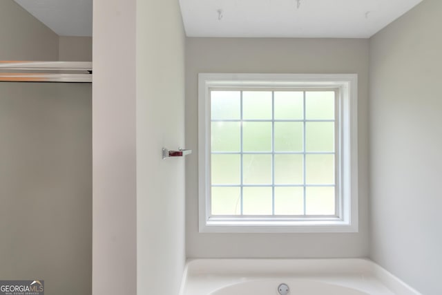 90 Heatherstone Way, Covington, GA 30016 - bathroom with a garden tub