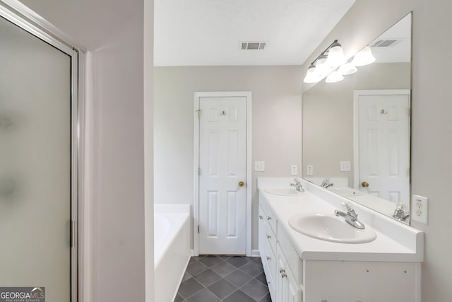 90 Heatherstone Way, Covington, GA 30016 - full bathroom featuring visible vents, a sink, and tile patterned floors