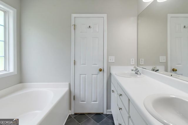 90 Heatherstone Way, Covington, GA 30016 - full bath with a sink, a bath, and tile patterned floors