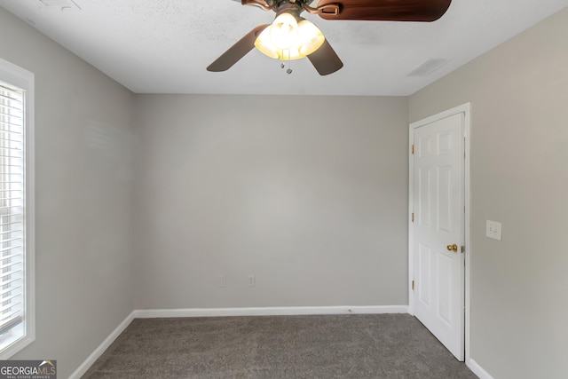 90 Heatherstone Way, Covington, GA 30016 - empty room with a healthy amount of sunlight, baseboards, and carpet