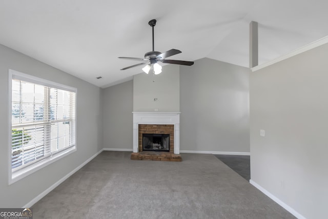 90 Heatherstone Way, Covington, GA 30016 - unfurnished living room with carpet flooring, ceiling fan, vaulted ceiling, and baseboards