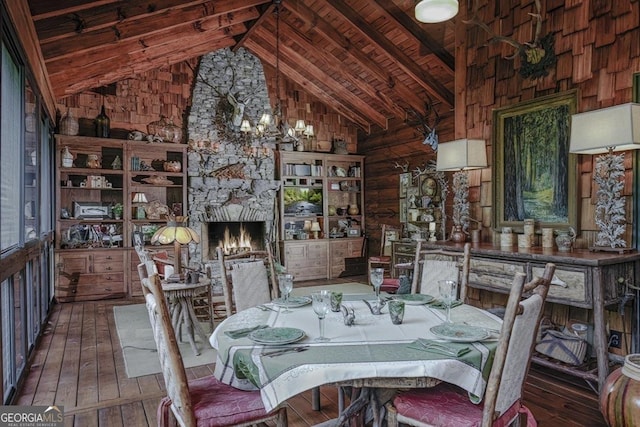 360 Cascade Pt, Ellijay, GA 30540 - dining room featuring hardwood / wood-style flooring, wood ceiling, beamed ceiling, a chandelier, and a fireplace