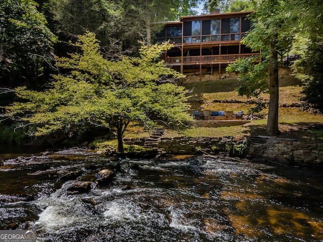 360 Cascade Pt, Ellijay, GA 30540 - view of yard featuring a sunroom, a forest view, and a deck