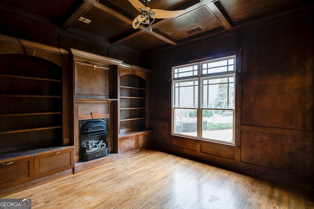 unfurnished living room featuring visible vents, ceiling fan, coffered ceiling, wooden ceiling, and light wood finished floors